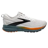 Brooks Trace running shoe, featuring a white mesh upper, black and orange accents, and a gray sole.