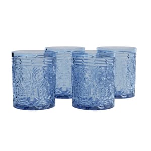 Set of four light blue drinking glasses with intricate embossed patterns, featuring a vintage-inspired design and cylindrical shape.
