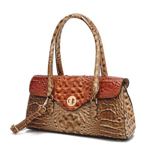 MKF Shoulder Bag featuring a faux crocodile pattern in brown and orange hues, equipped with two handles and a gold-tone twist-lock closure.