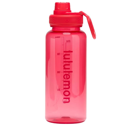 Red Lululemon water bottle with a screw cap, carrying loop, and measurement markings on the side.