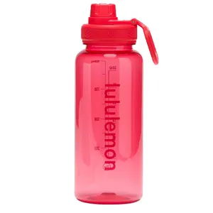 Red Lululemon water bottle with a screw cap, carrying loop, and measurement markings on the side.
