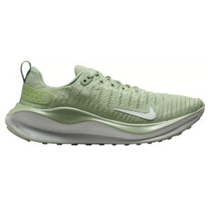 A light green Nike running shoe with a white swoosh and React cushioning, featuring a knit upper and textured midsole for added comfort and style.