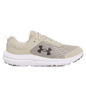 UA Men's Charged Assert 10 is a beige running shoe featuring a mesh upper for breathability, a black Under Armour logo, and a cushioned white sole designed for comfort and support.