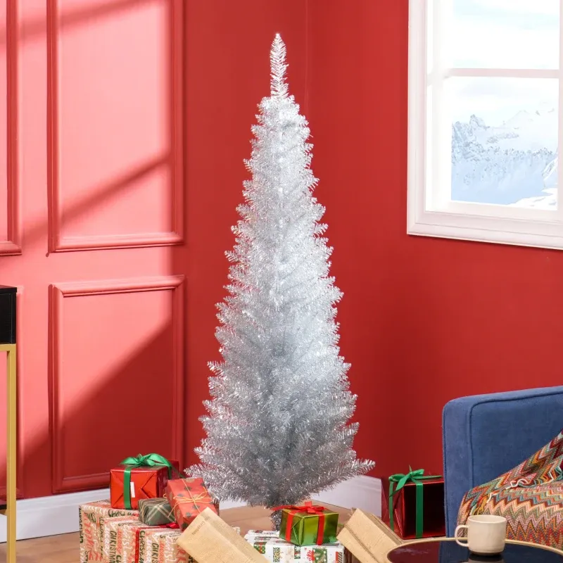 A silver tinsel Christmas tree is set up in a room with red walls, next to a window showing a snowy landscape. Below the tree are wrapped gifts in festive paper and ribbons.