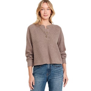 Old Navy Cozy Thermal Tees feature a waffle-knit texture and a relaxed fit with long sleeves and a partial button-front design. They provide a casual and comfortable look, ideal for layering or wearing alone.