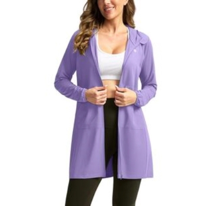 A woman wearing a long, purple hooded jacket over a white sports bra and black leggings.