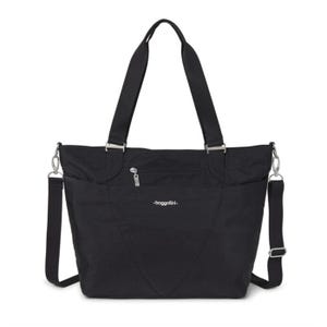 A black tote bag with shoulder straps, a removable crossbody strap, and a front zipper pocket.