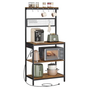 A kitchen rack with shelves holds a coffee machine, toaster, microwave with food inside, kettle, air fryer, and cookware. The top section has hooks for cups and storage jars.