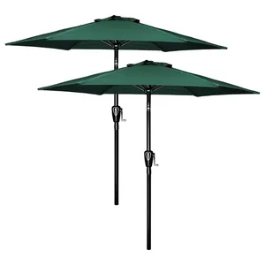 Set of two green outdoor patio umbrellas with black poles and crank handles for easy opening and closing.