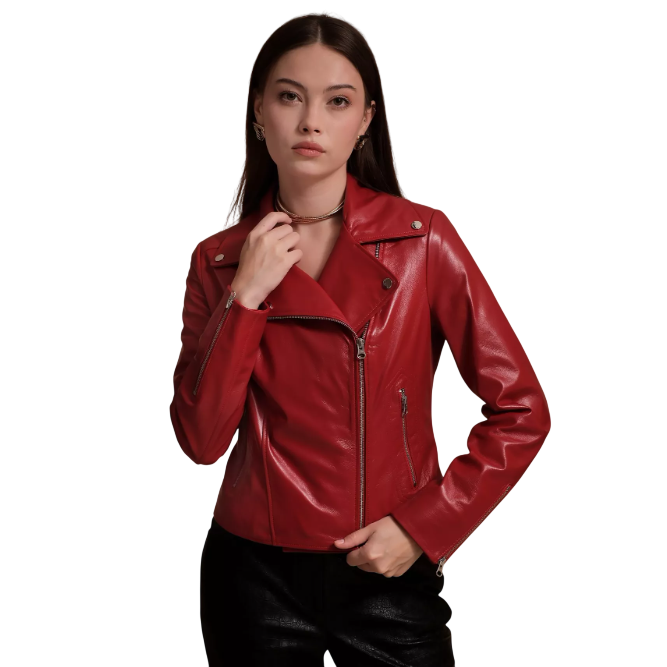 A woman is wearing a red leather motorcycle jacket with asymmetrical zippers and silver hardware, paired with black pants.