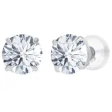 A pair of round diamond stud earrings set in metal prongs with backings, featuring a classic sparkling design.