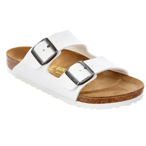 White sandal with two adjustable buckled straps and a cork footbed.
