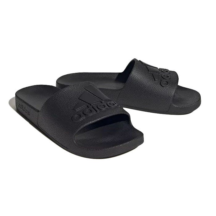 Black Adidas Adilette Aqua Sandals featuring a slip-on design, contoured footbed, and the Adidas logo on the strap.