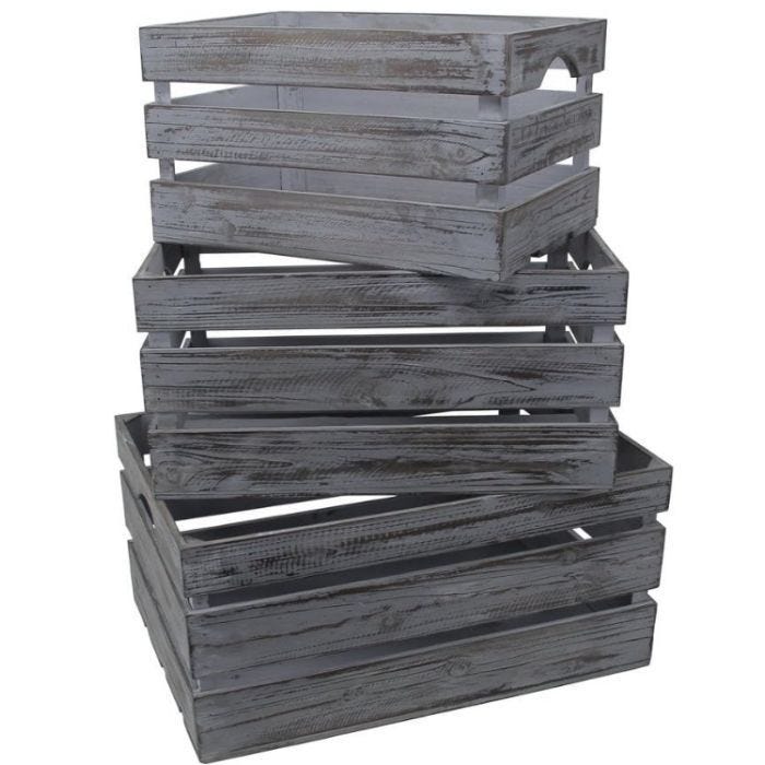 Stack of rustic wooden crates in a weathered gray finish, featuring slatted sides and handles for easy carrying.