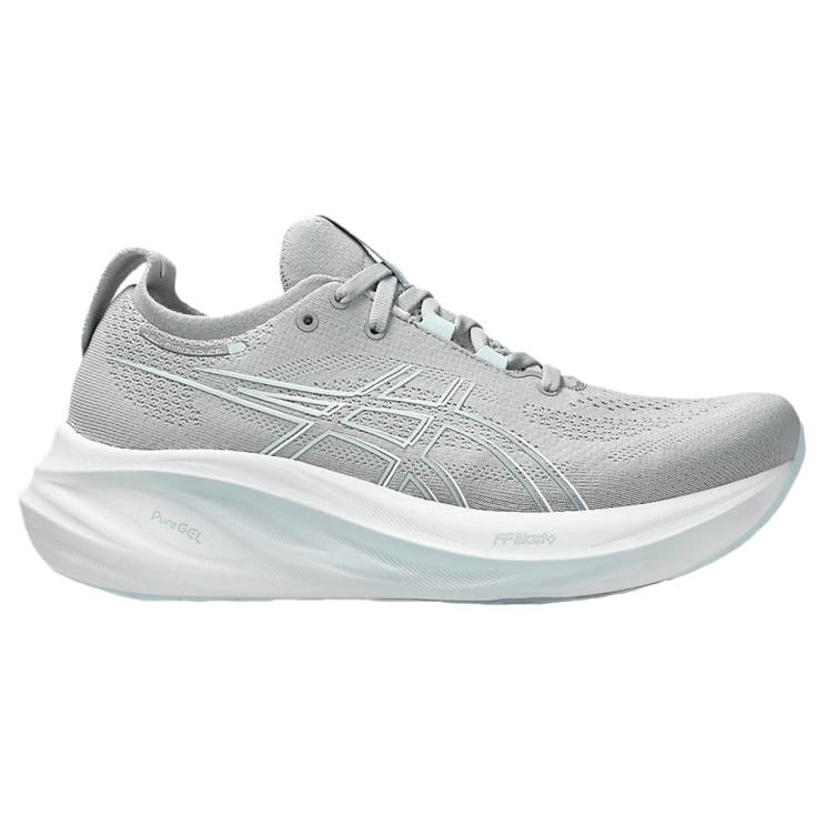 ASICS Gel-Nimbus 26 Running Shoes feature a light grey design with a breathable mesh upper, accented by the signature ASICS stripes. They have a cushioned, thick white sole with FF Blast and PureGEL technology for comfort and support.