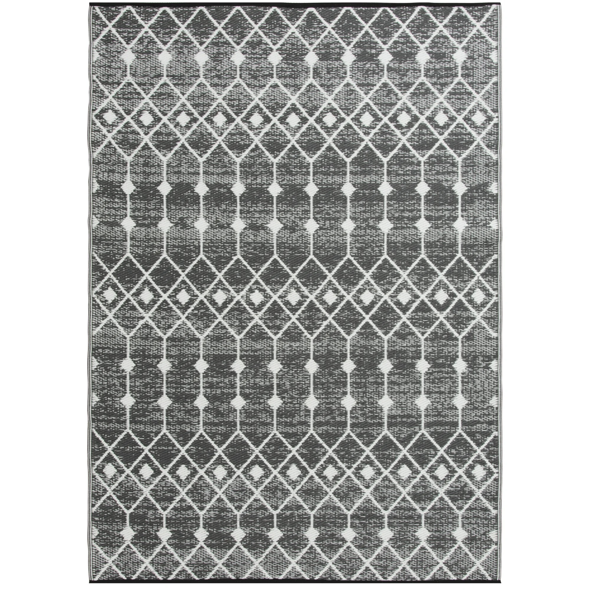 A gray and white patterned area rug.