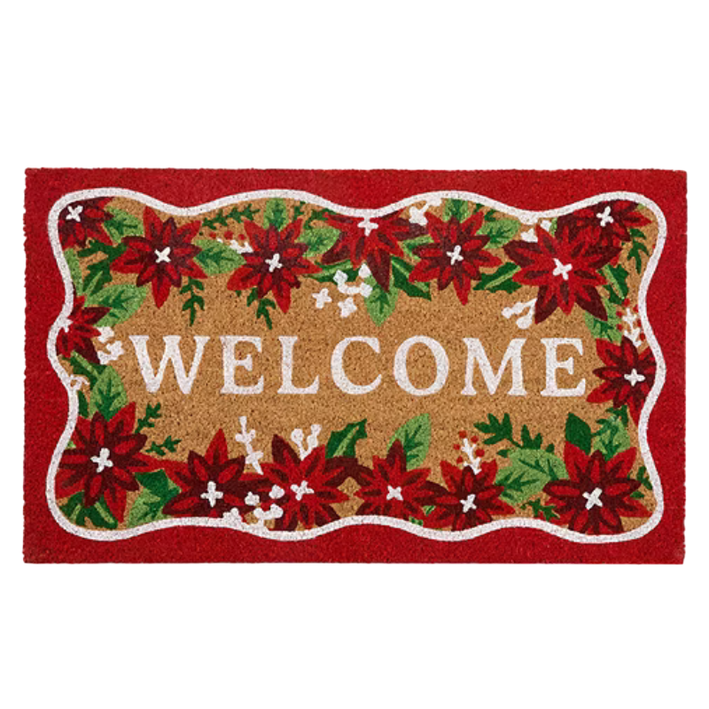 A welcome doormat featuring red poinsettia flowers and green leaves, set against a tan background with a red border.