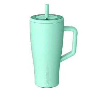 A mint green insulated mug with a handle, lid, and straw, featuring \“BRUMATE\“ branding.