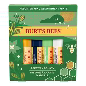 Burt's Bees Holiday Lip Balm Set, \“Beeswax Bounty,\“ includes four flavors: Beeswax, Vanilla Bean, Cucumber Mint, and Coconut & Pear, in a green holiday-themed package with floral and honeycomb designs.