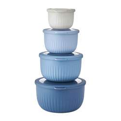 A stack of four round, ribbed plastic food storage containers in varying shades of blue with lids, arranged from smallest to largest.