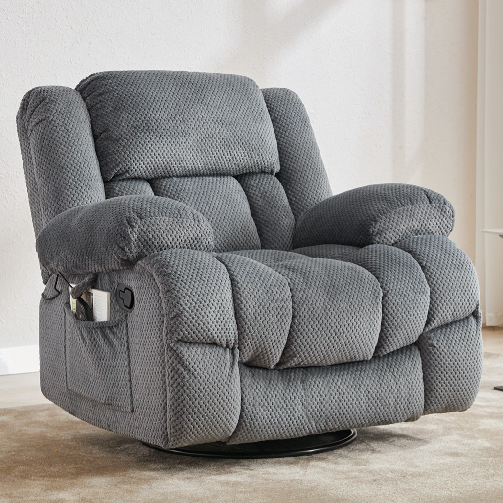 A gray textured recliner chair with padded armrests, a headrest, and a side pocket, placed in a minimal living space with light decor.