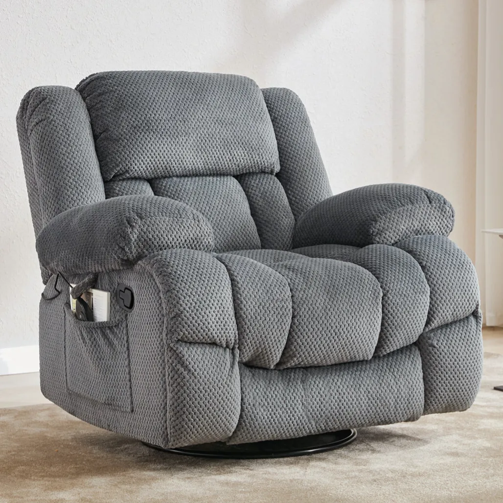 A gray textured recliner chair with padded armrests, a headrest, and a side pocket, placed in a minimal living space with light decor.