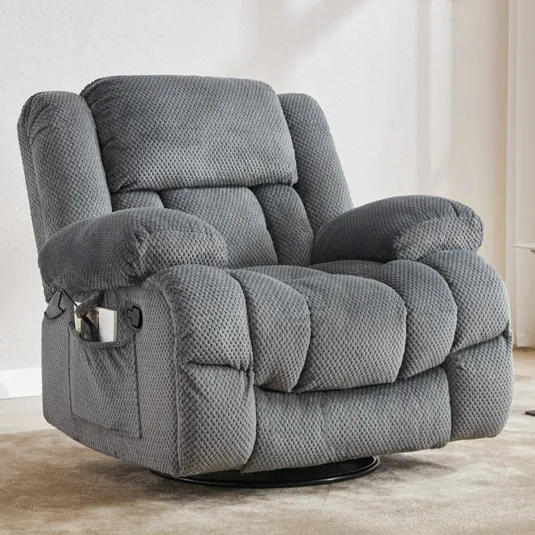 A gray textured recliner chair with padded armrests, a headrest, and a side pocket, placed in a minimal living space with light decor.