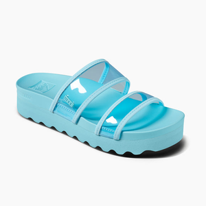 A pair of light blue platform sandals with double straps and a ridged sole.