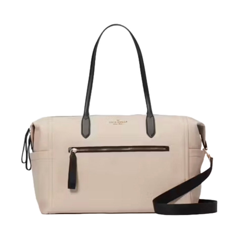 Kate Spade Large Weekender Bag in beige with black handles and a detachable strap, featuring a front zip pocket and subtle logo detailing.