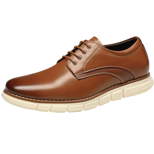 Brown leather dress shoe with a sleek design, featuring lace-up closure and white cushioned sole for comfort.