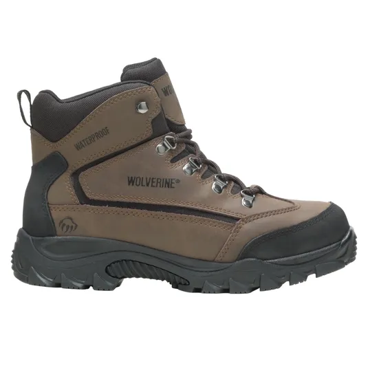 Brown waterproof hiking boot with black accents, labeled \“Wolverine,\“ featuring rugged soles and metal eyelets for laces.