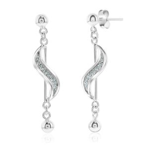 Silver tone earrings with a wavy design featuring embedded sparkly elements and small round accents at the bottom.