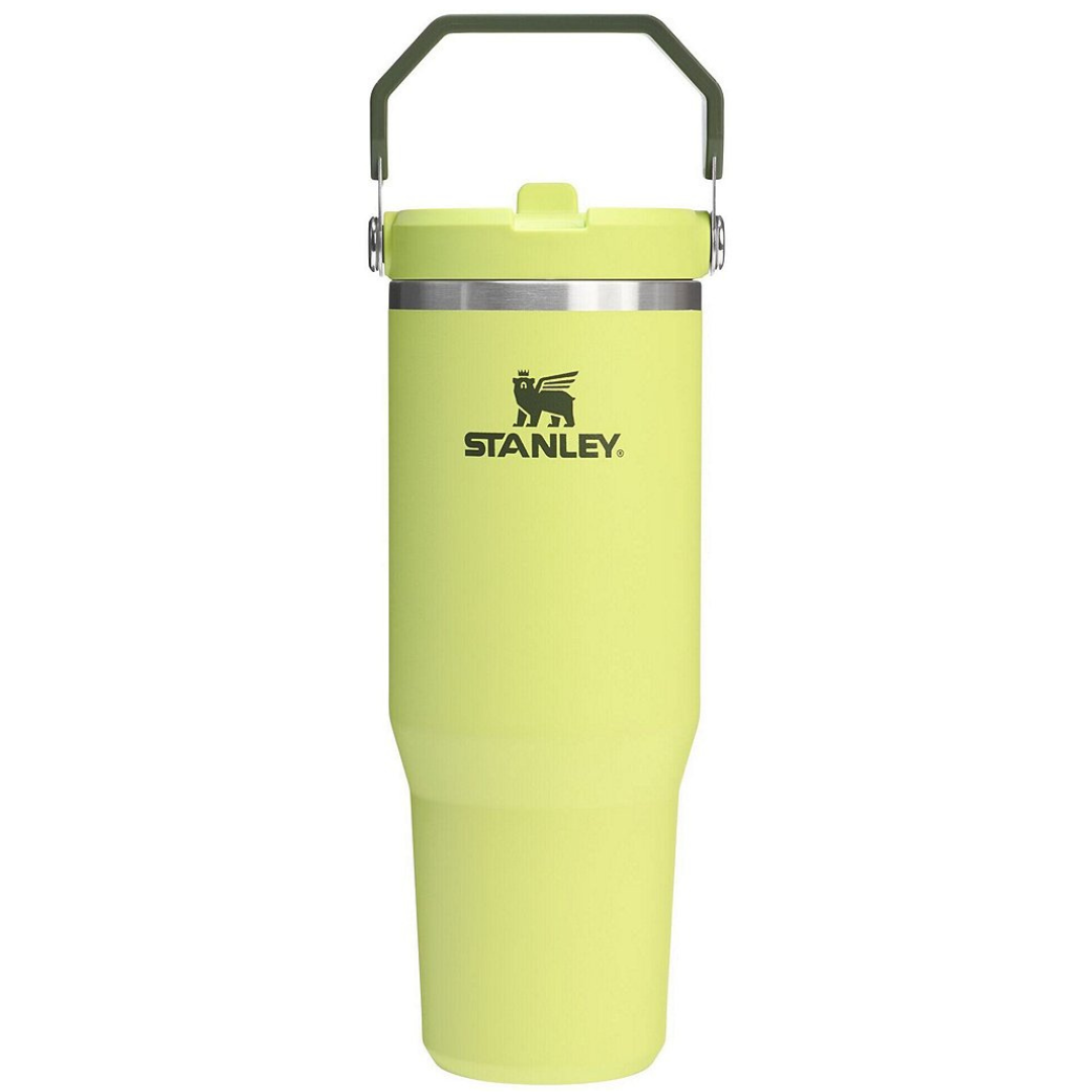 Lime green Stanley insulated tumbler with a handle, featuring a logo on the front.
