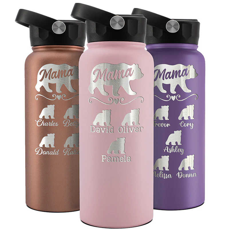 Three personalized water bottles in bronze, pink, and purple feature a \“Mama\“ bear design with cubs below, each labeled with names like Charles and Betty. They have black flip-top lids with a silver button.