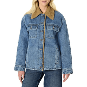 Blue denim jacket with a tan sherpa collar and button closures, featuring chest pockets and side pockets, paired with matching denim jeans.