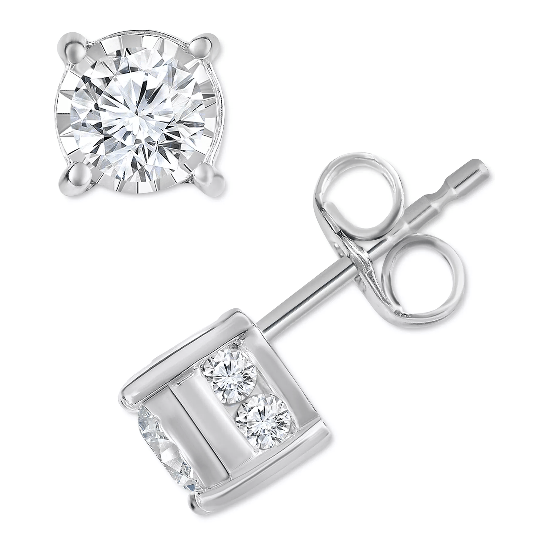 A pair of silver stud earrings with round, clear gemstones, featuring a prong setting and push-back closure, showcasing one main stone with smaller stones accented on the side.