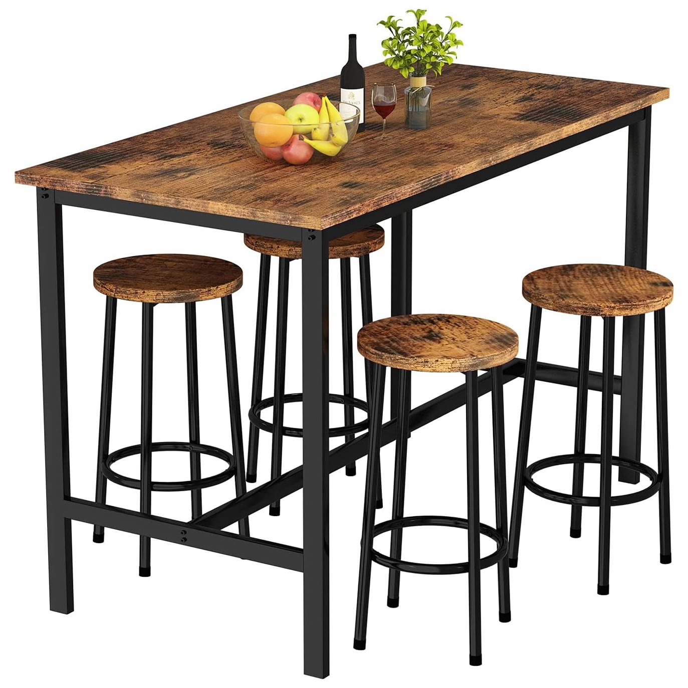 A rustic wooden bar table with black metal legs, accompanied by four matching round stools. The table is adorned with a bowl of fruit, a bottle of wine, glasses, and a small plant.