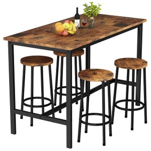 A rustic wooden bar table with black metal legs, accompanied by four matching round stools. The table is adorned with a bowl of fruit, a bottle of wine, glasses, and a small plant.