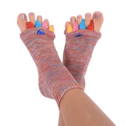 Colorful toe alignment socks featuring separate slots for each toe. The socks have a multicolored knit pattern and allow toes to be individually positioned, promoting relaxation and comfort.