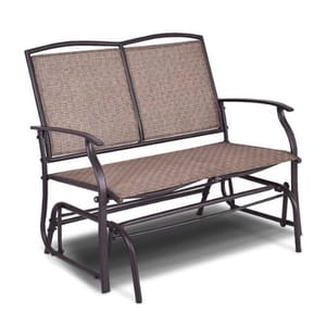 Brown metal rocking patio glider with textured seat and backrest, featuring curved armrests and a sturdy frame for outdoor seating.