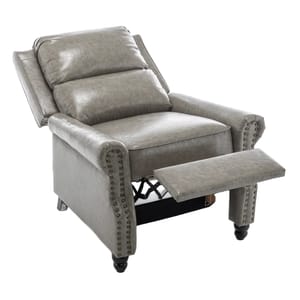 A gray faux-leather recliner with plush cushioning, nailhead trim, and a footrest. Designed for comfort, it features rolled arms and a classic, stylish appearance.