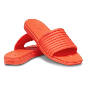 Bright orange Crocs Women's Miami Slide Sandals featuring a textured, ribbed strap design and a cushioned footbed for comfort.