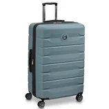 A large, hard-shell suitcase with a textured blue design, featuring a retractable handle, four spinner wheels, and a circular logo on the front.