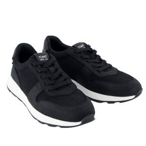 Black sneakers with a sleek design, featuring black laces, a white midsole, and branding on the tongue.