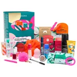 Sephora Advent Calendar with assorted beauty products includes masks, makeup wipes, lipstick, nail polish, sponge, setting spray, eyeliner, eyeshadow, and hair accessories.