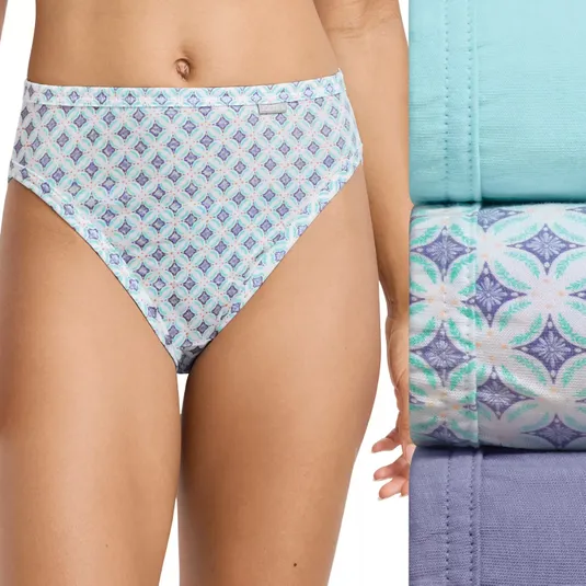 A high-waisted patterned panty is displayed alongside fabric swatches in solid teal, patterned, and solid purple.