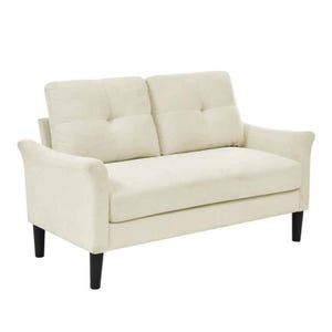 A cream-colored loveseat with tufted back cushions and black legs.