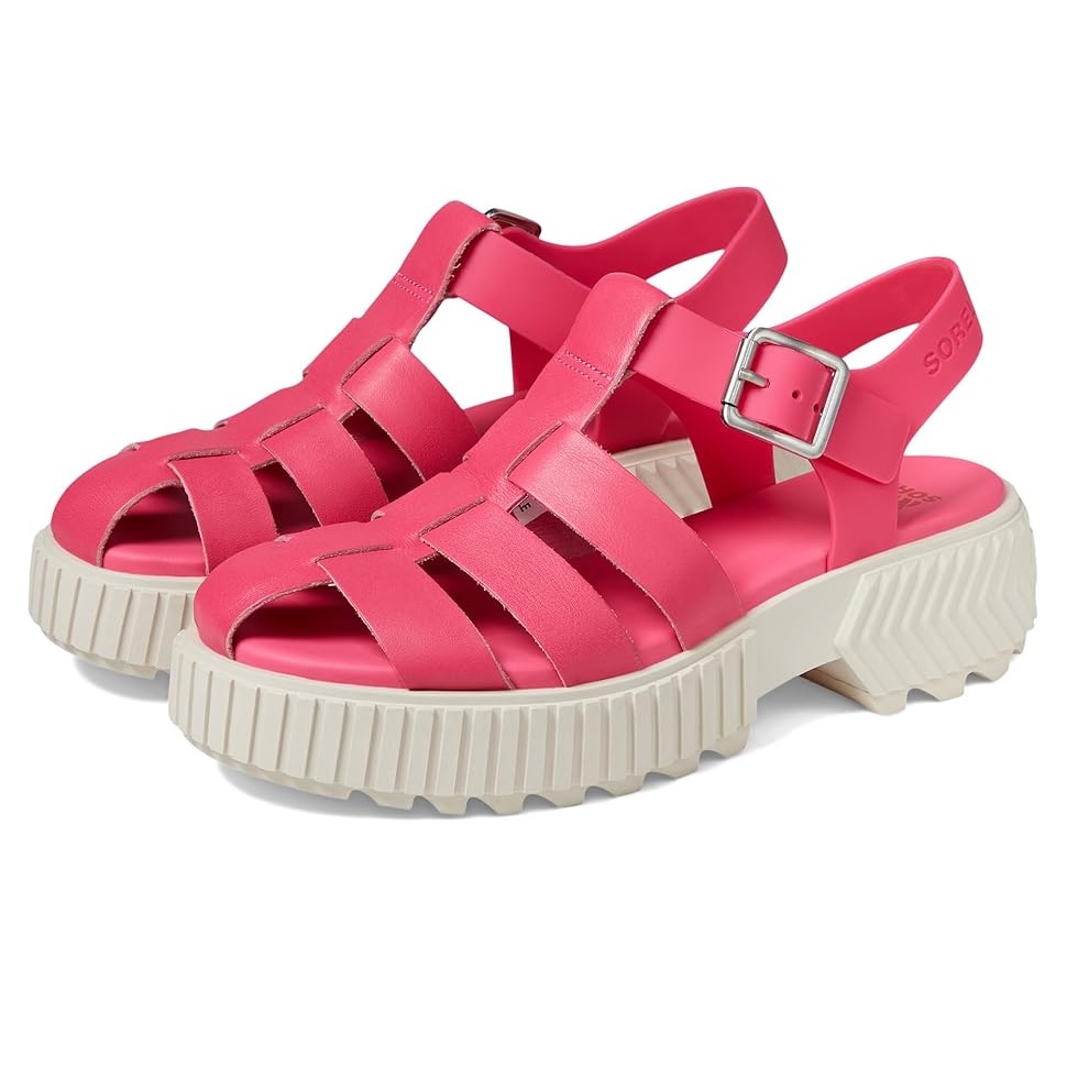 Bright pink fisherman sandals with a modern design featuring a chunky white textured sole and buckle closure, offering a stylish, open-toe look.