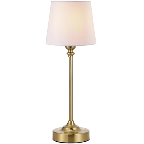 A brass table lamp with a slim, tall base and a white, tapered fabric shade.