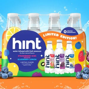 A variety of Hint flavored water bottles in strawberry kiwi, grape, and blueberry lemon flavors.